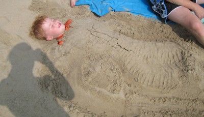 med-IMG_0715 It was tempting to leave Gavin to take a nap in the sand.